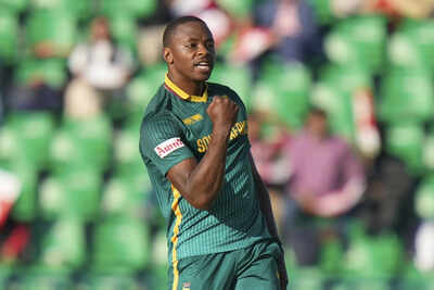 South Africas Kagiso Rabada celebrates the dismissal of New Zealands Rachin Ra
